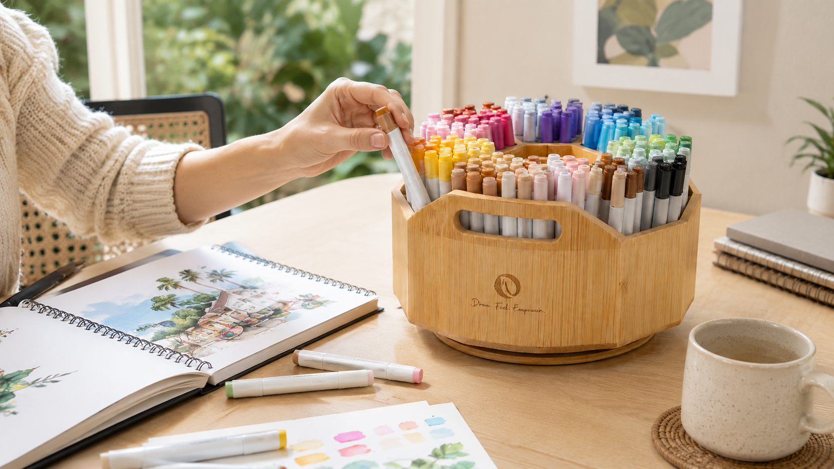 Ohuhu Rotating Marker Organizer Review Person reaching for a marker from the Ohuhu Rotating Marker Organizer at a home desk